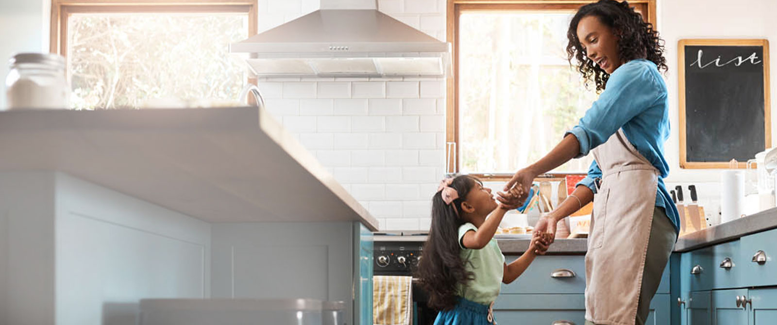 Mother and daughter in kitchen