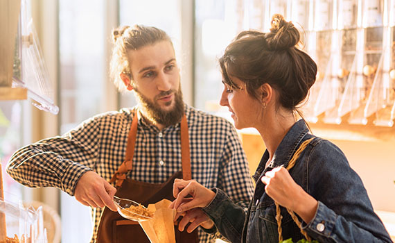 Business owner helping customer