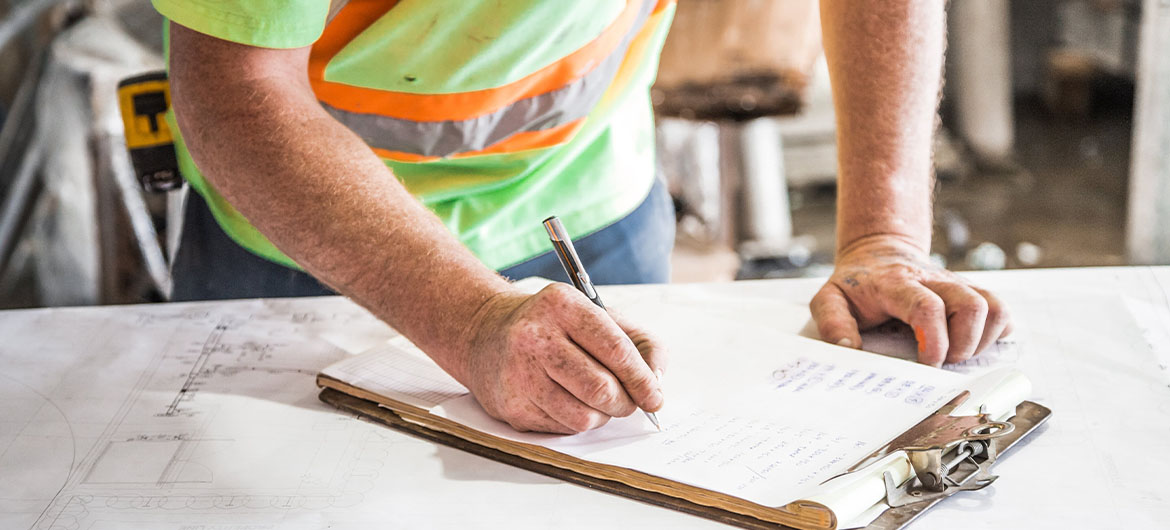 Business contractor with clipboard