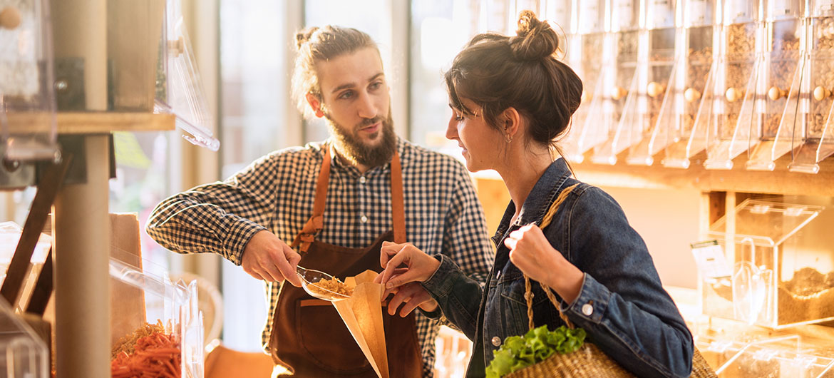 Small business owner working with customer