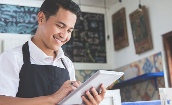 Man doing banking on his tablet