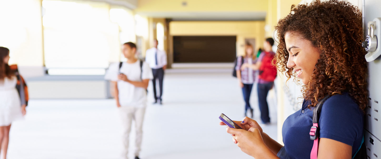 teen using mobile banking