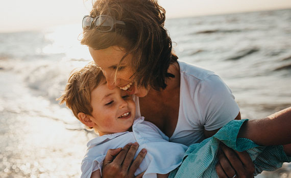 Mother and son on a beach