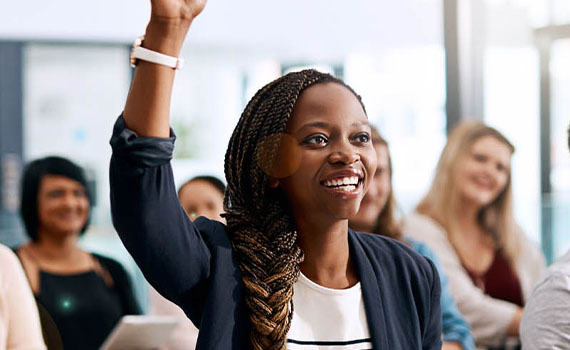 Woman raising hand with question