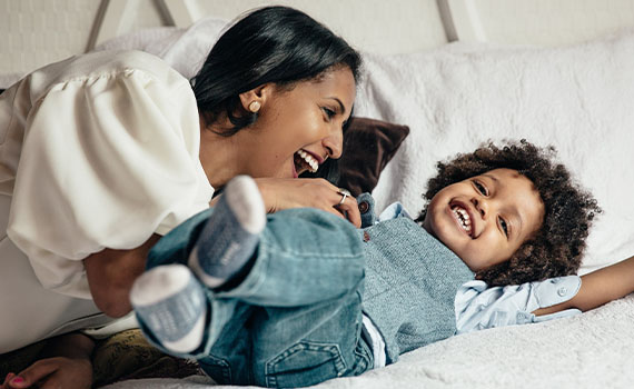 Mother and son happily playing